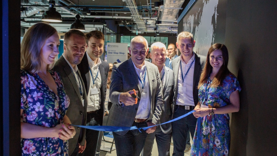 Official Ribbon Cutting Ceremony at the Symphony ROC Krakow. (pictured L-R) Magda Fortuna-Sanocka, Ian Barkin, David Brain, David Poole, Bill Thomas, Pascal Baker and Gabriela Kostkowski